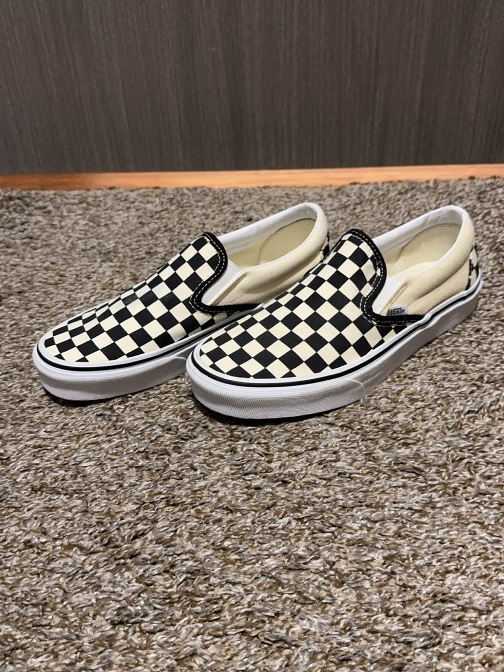 Vans Checkerboard Slip-On Sneakers in Black and Cream